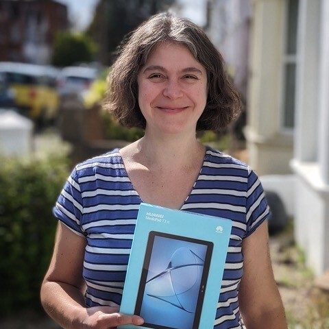 Digital Champion Anna Dolphin, distributing tablets to isolated people in Brighton & Hove and helping them get started online